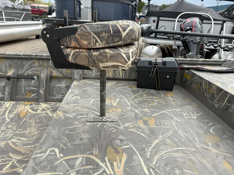 Slide: The Image of 2024 War Eagle 754LDV Sportsman boat with camo seat and deck. - 9