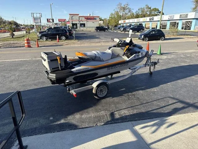 Slide: The Image of 2023 Sea-Doo Waverunner FishPro™ Trophy on trailer in parking lot. - 12