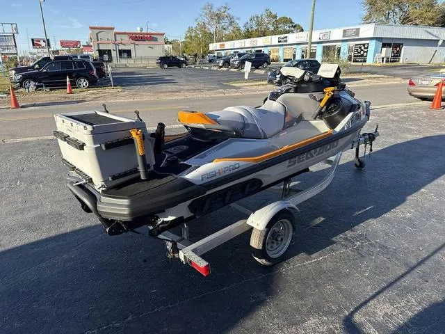 Slide: The Image of 2023 Sea-Doo FishPro™ Trophy Waverunner on trailer in parking lot. - 13