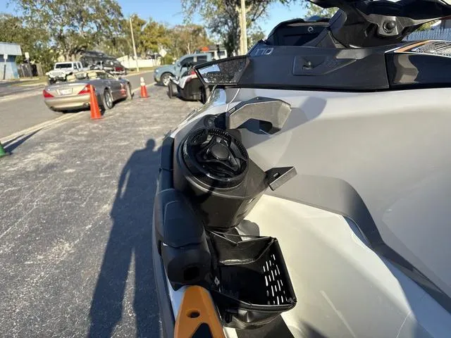 Slide: The Image of 2023 Sea-Doo Waverunner FishPro™ Trophy parked outdoors, showcasing side details. - 6