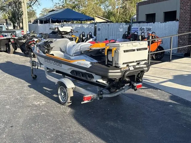 Slide: The Image of 2023 Sea-Doo Waverunner FishPro™ Trophy on trailer at dealership parking lot. - 9