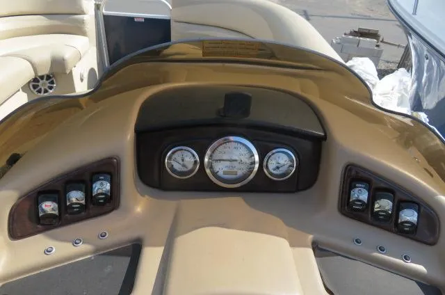 Slide: The Image of Dashboard of a 2014 Bennington 2275 GCW boat with gauges and controls. - 14