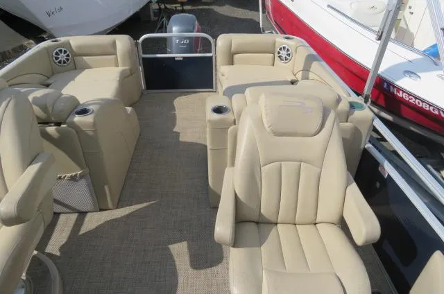 Slide: The Image of 2014 Bennington 2275 GCW pontoon boat with beige seating and spacious layout. - 6