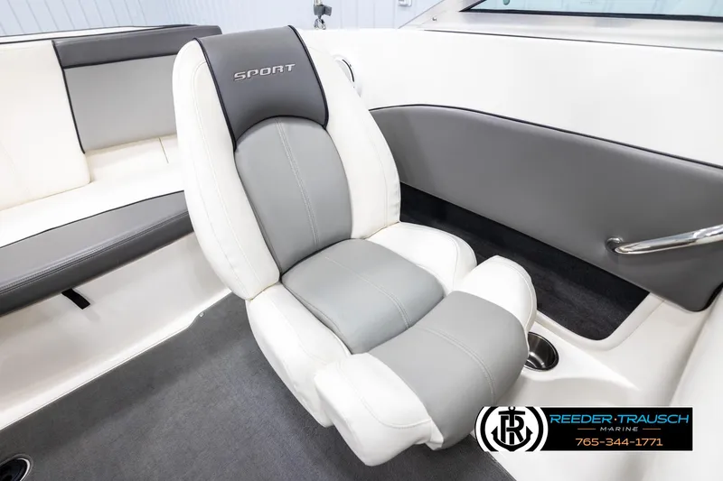 Slide: The Image of 2011 Sea Ray 185 Sport boat interior with gray and white seating. - 23