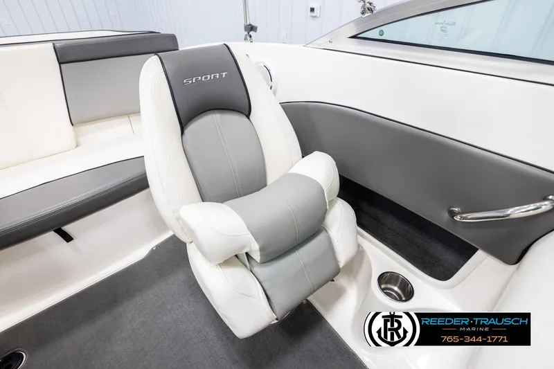 Slide: The Image of 2011 Sea Ray 185 Sport boat interior with gray and white seating, featuring "Sport" branding. - 24