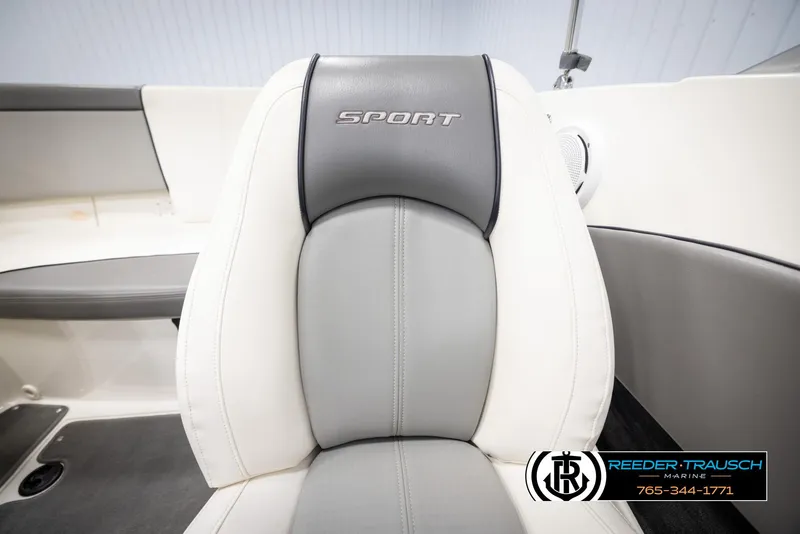 Slide: The Image of 2011 Sea Ray 185 Sport boat seat with "Sport" logo, white and gray upholstery. - 38