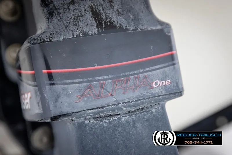 Slide: The Image of 2011 Sea Ray 185 Sport Alpha One outdrive detail with Reeder-Trausch Marine logo. - 45