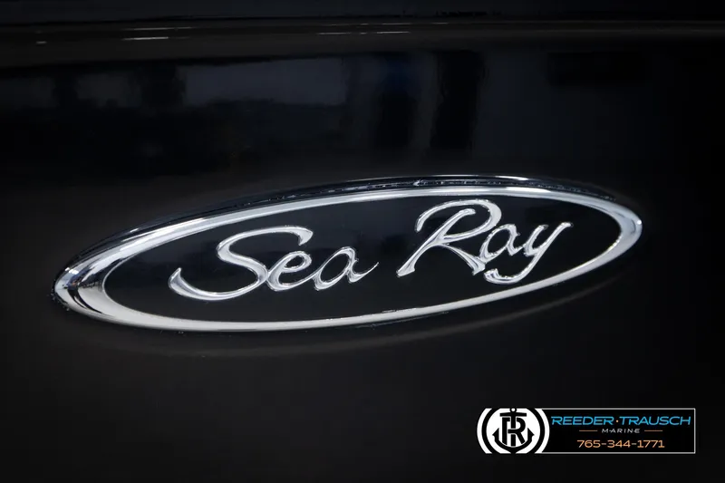 Slide: The Image of Sea Ray 185 Sport 2011 logo on black background, Reeder-Trausch Marine branding. - 48