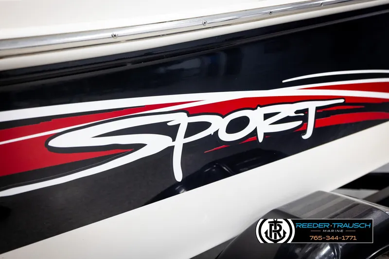 Slide: The Image of 2011 Sea Ray 185 Sport boat with bold "Sport" graphic design. - 49
