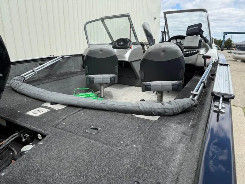 Slide: The Image of 2014 Tracker Pro Guide V-175 WT boat interior with seating and dashboard. - 6