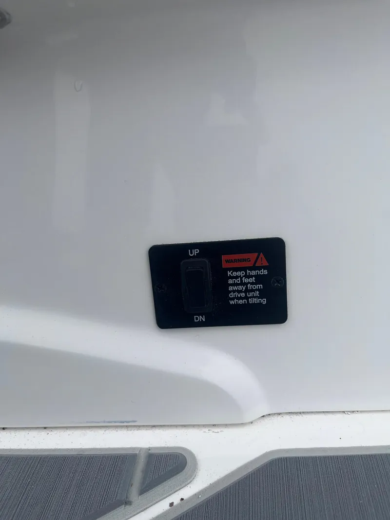 Slide: The Image of 2025 Regal LS6 boat switch panel with safety warning label. - 18