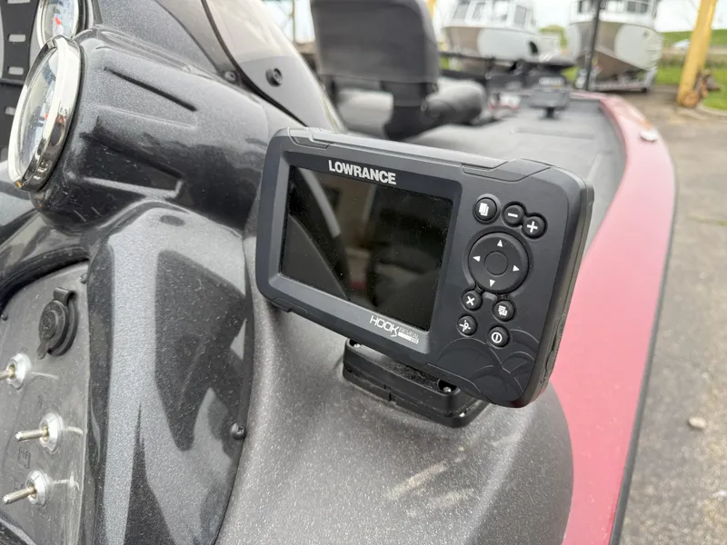 Slide: The Image of Lowrance fish finder on 2022 Tracker Pro Team 190 TX boat dashboard. - 10