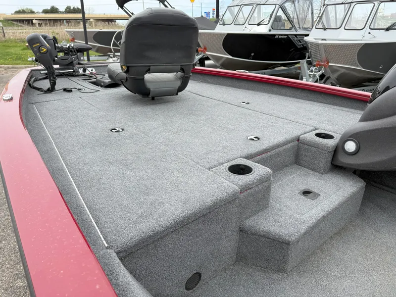 Slide: The Image of 2022 Tracker Pro Team 190 TX boat with spacious deck and seating. - 11