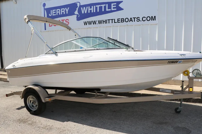 Slide: The Image of 2006 Four Winns 180 Horizon boat on trailer at dealership. - 10