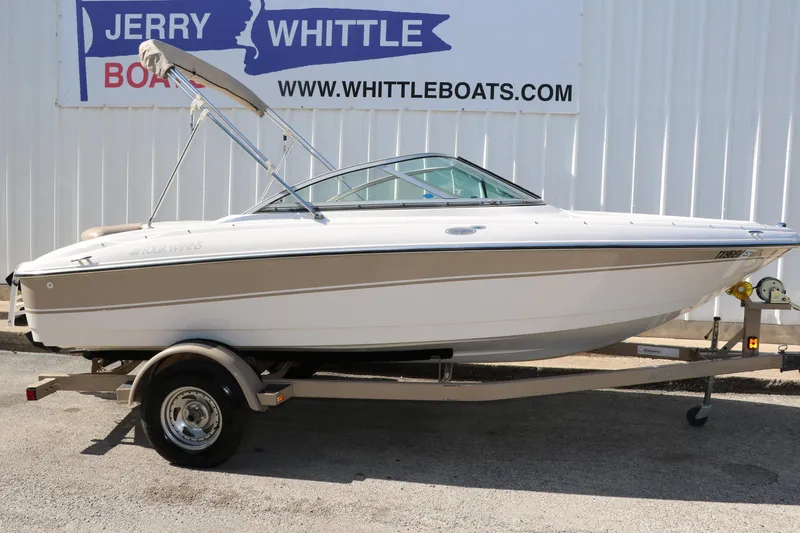 Slide: The Image of 2006 Four Winns 180 Horizon boat on trailer, displayed at Jerry Whittle Boats. - 11