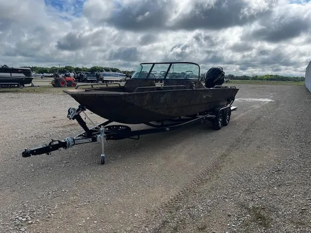 Slide: The Image of 2025 G3 Sportsman 2400 boat on trailer under cloudy sky. - 3