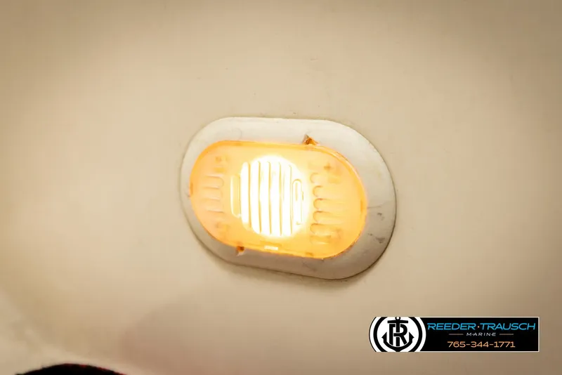 Slide: The Image of Interior light fixture on a 2002 Rinker 192 Captiva boat ceiling. - 46