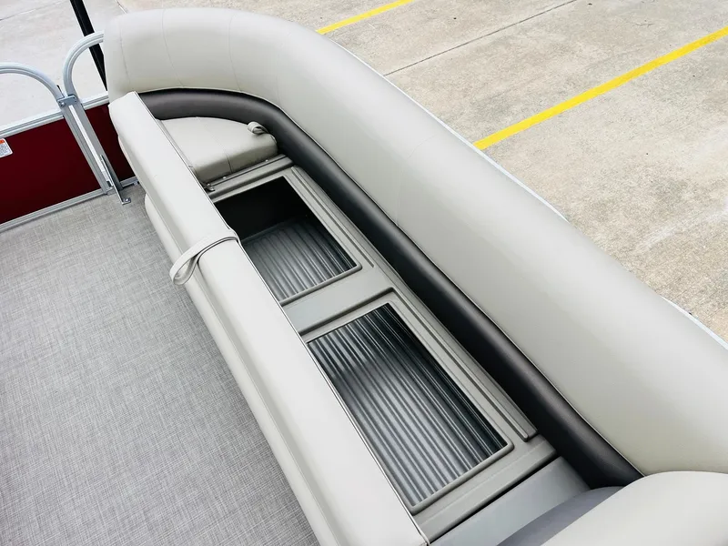 Slide: The Image of 2025 Sun Tracker Party Barge 18 DLX pontoon seating with storage compartments. - 20