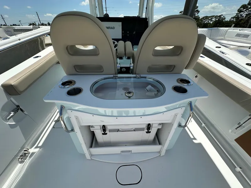 Slide: The Image of 2025 Sea Pro 292 Offshore boat interior with dual seats and fishing station. - 12