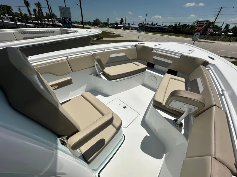 Slide: The Image of 2025 Sea Pro 292 Offshore boat with spacious seating and modern design. - 5