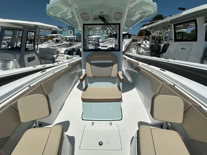 Slide: The Image of 2025 Sea Pro 292 Offshore boat interior with beige seating and modern design. - 6