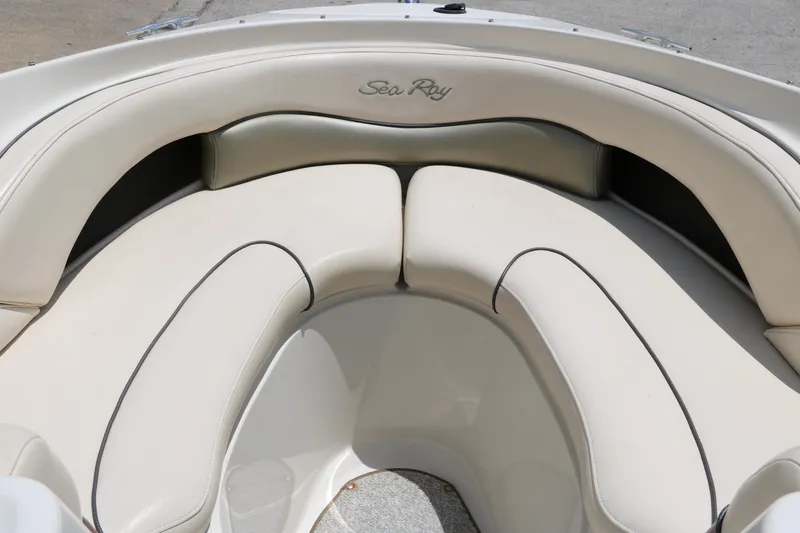 Slide: The Image of 2004 Sea Ray 220 Select boat interior with cream leather seating. - 31
