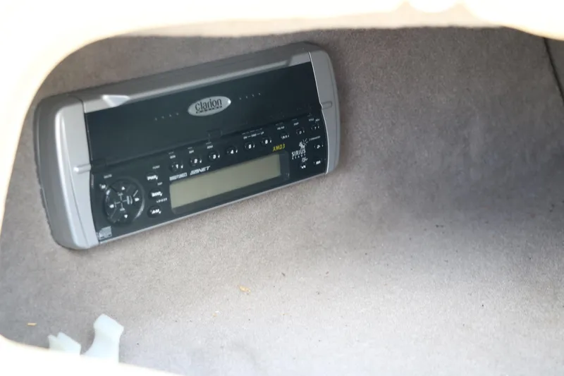 Slide: The Image of Clarion stereo system in a 2004 Sea Ray 220 Select boat interior. - 37