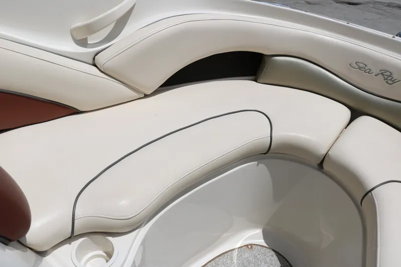 Slide: The Image of 2004 Sea Ray 220 Select boat interior with cream leather seating. - 42