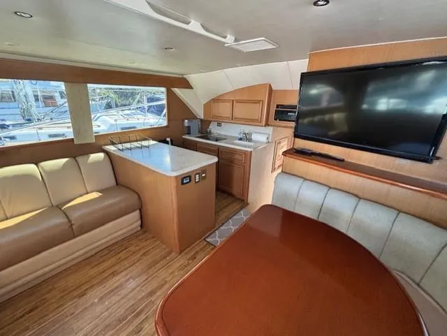 Slide: The Image of Luxurious interior of 2007 Jersey Cape 44 CNV yacht with modern amenities and elegant design. - 28