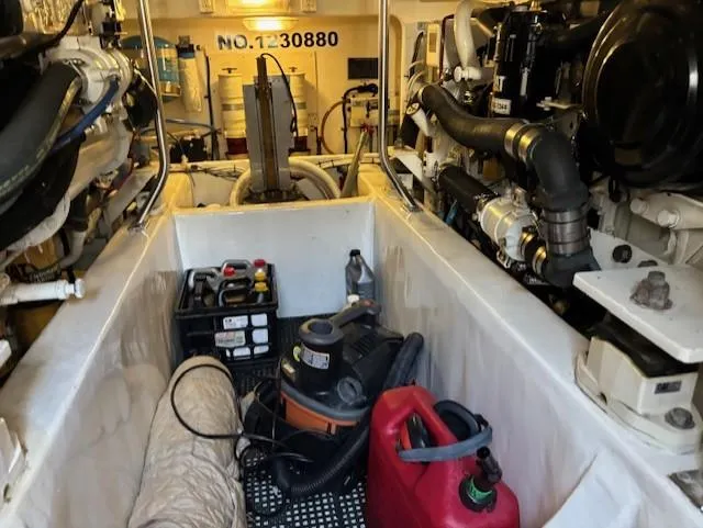 Slide: The Image of Engine room of 2007 Jersey Cape 44 CNV boat with equipment and tools. - 31