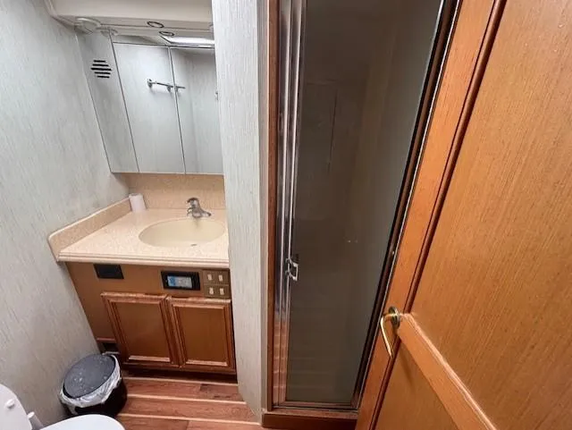 Slide: The Image of Bathroom interior of 2007 Jersey Cape 44 CNV yacht with shower and sink. - 37