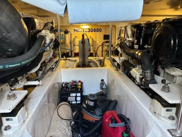 Slide: The Image of Engine room of 2007 Jersey Cape 44 CNV boat, featuring equipment and machinery. - 4