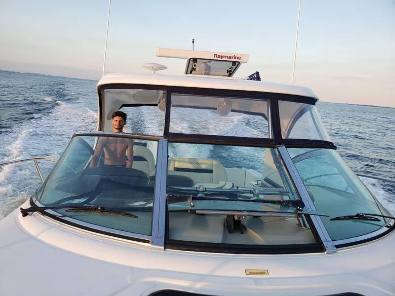 Slide: The Image of Shower area in 2004 Sea Ray 390 Sundancer yacht, featuring modern fixtures. - 7