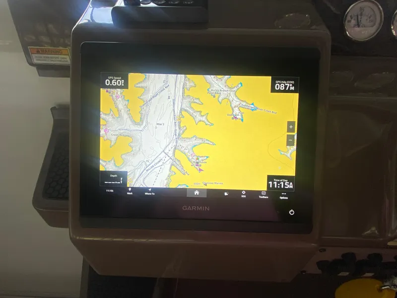 Slide: The Image of Garmin navigation display on 2005 Regal 3350 Sport Cruiser dashboard. - 28