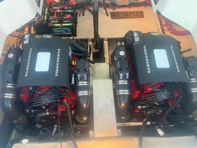 Slide: The Image of Twin Volvo Penta engines in a 2005 Regal 3350 Sport Cruiser. - 33