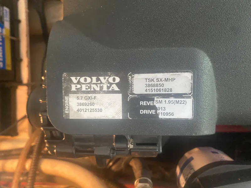 Slide: The Image of Volvo Penta engine label on 2005 Regal 3350 Sport Cruiser, model 5.7 GXi-F. - 34