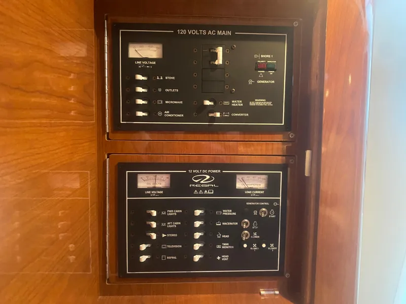 Slide: The Image of Electrical control panel on a 2005 Regal 3350 Sport Cruiser boat. - 37