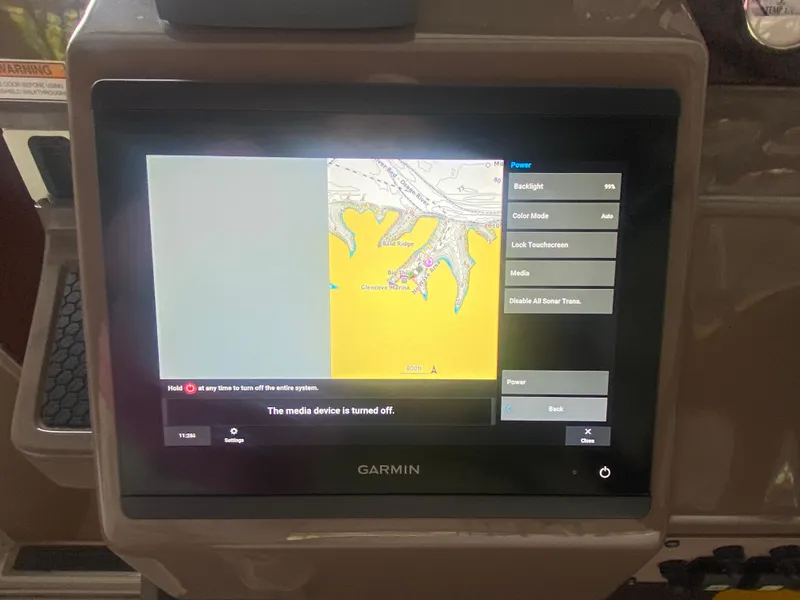 Slide: The Image of Garmin navigation screen on 2005 Regal 3350 Sport Cruiser displaying a nautical map. - 40