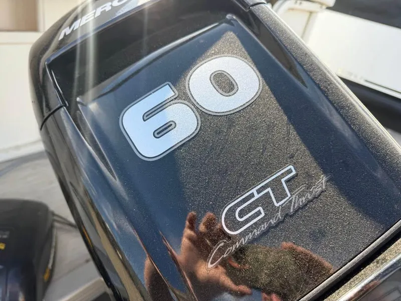 Slide: The Image of Outboard motor with "60 CT Command Thrust" label on a 2008 Bentley Pontoons 180 CRUISE. - 14