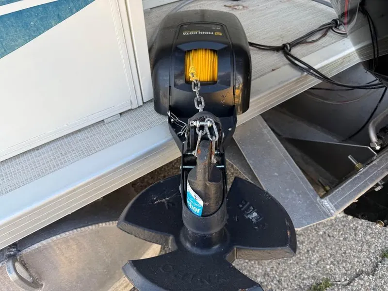 Slide: The Image of 2008 Bentley Pontoons 180 CRUISE anchor system with yellow rope on deck. - 15