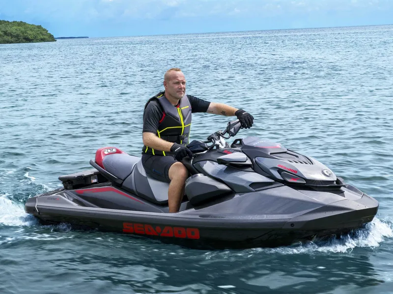 Slide: The Image of 2024 Sea-Doo GTR-X 300 iBR jet ski on water, featuring sound system. - 11