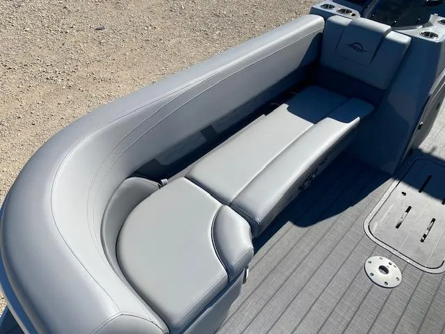 Slide: The Image of Luxurious seating on 2025 SunCatcher Fusion 322RC boat, featuring sleek gray upholstery. - 3
