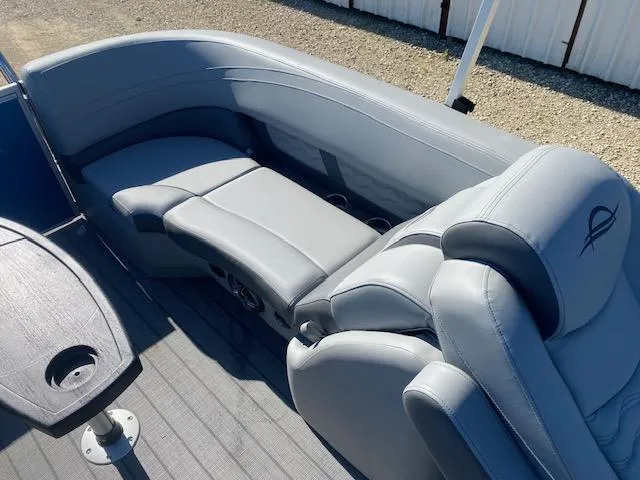 Slide: The Image of Luxurious seating on 2025 SunCatcher Fusion 322RC boat, featuring sleek gray upholstery. - 9