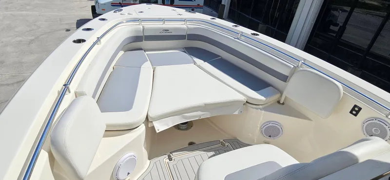 Slide: The Image of 2019 Cobia 280 Center Console boat with spacious seating and modern design. - 10