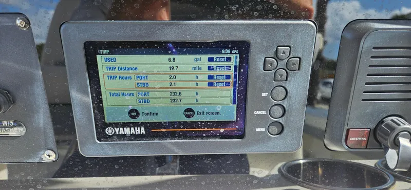 Slide: The Image of Yamaha display on 2019 Cobia 280 Center Console showing trip data and fuel usage. - 9