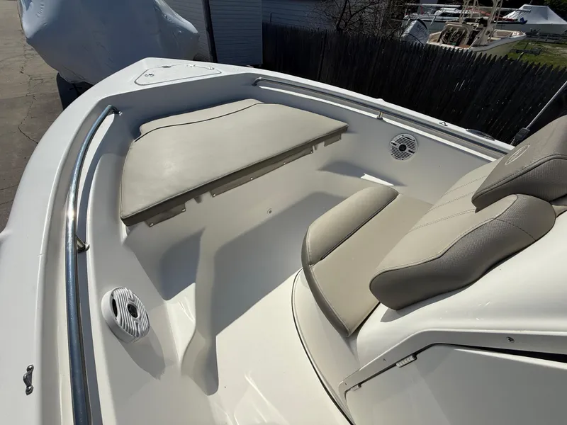 Slide: The Image of 2021 Key West 189 FS boat interior with cushioned seating and sleek design. - 16