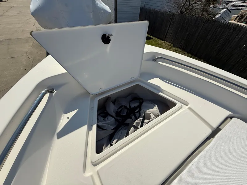 Slide: The Image of Open storage compartment on 2021 Key West 189 FS boat deck. - 18