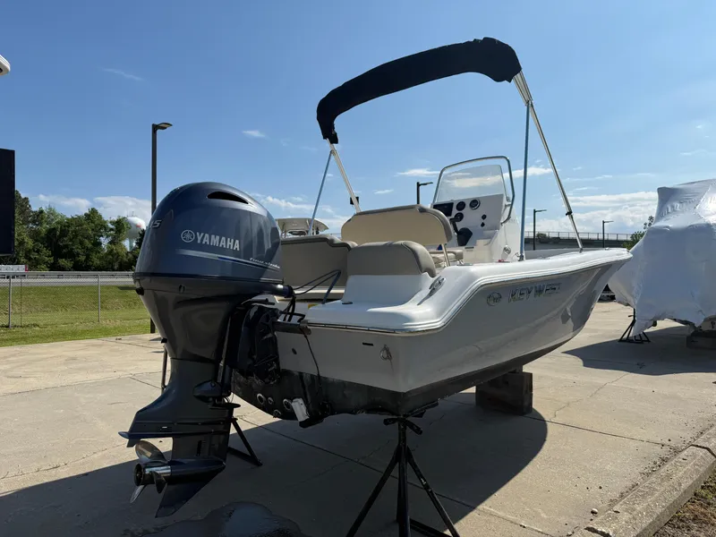 Slide: The Image of 2021 Key West 189 FS boat with Yamaha outboard motor on a sunny day. - 3