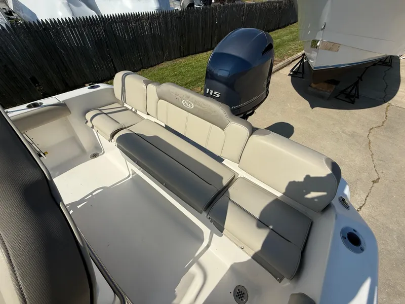 Slide: The Image of 2021 Key West 189 FS boat with Yamaha 115 engine, featuring comfortable seating. - 7