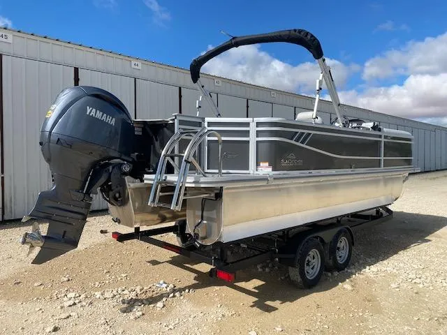 Slide: The Image of 2025 SunCatcher Select 322RF pontoon boat with Yamaha engine on trailer. - 6